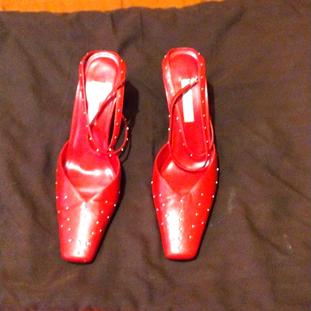 Red high heel pumps. Worn only once